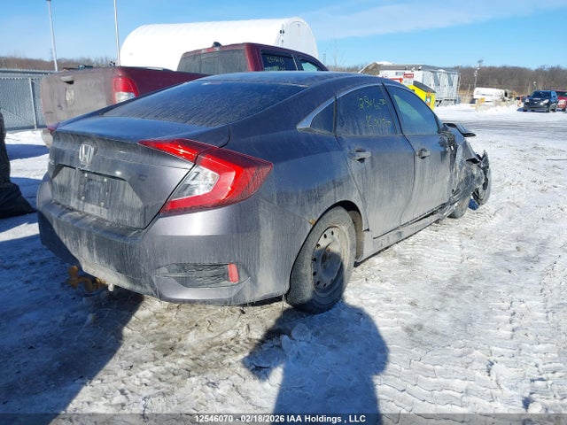 2HGFC2E5XGH011810 Honda Civic Lx