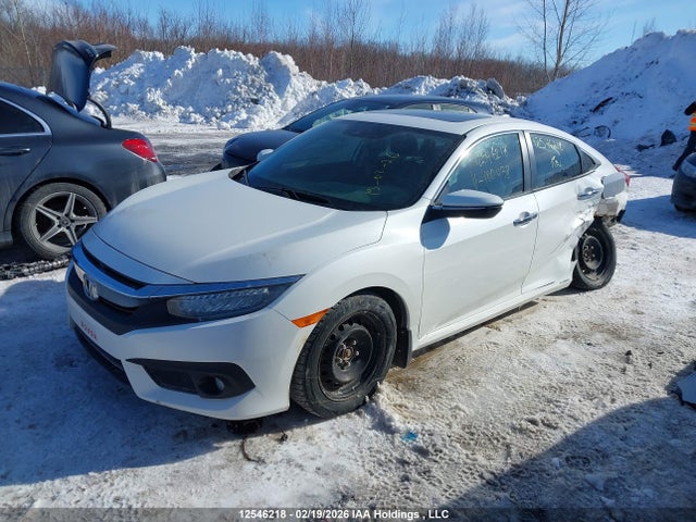 2HGFC1F95HH100438 Honda Civic Touring