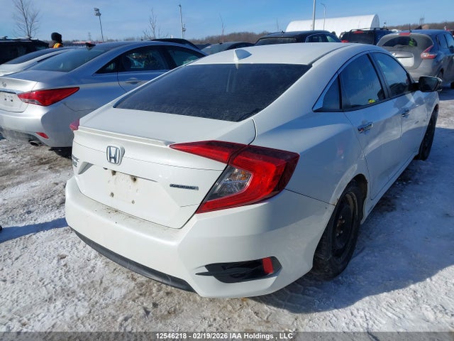 2HGFC1F95HH100438 Honda Civic Touring