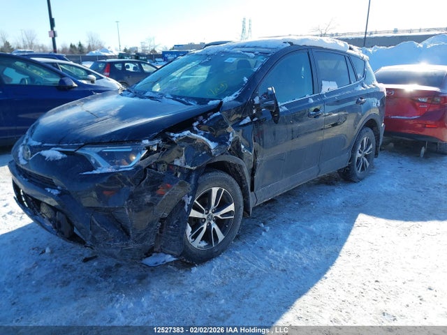 2T3ZFREV9JW503005 Toyota RAV4 LE