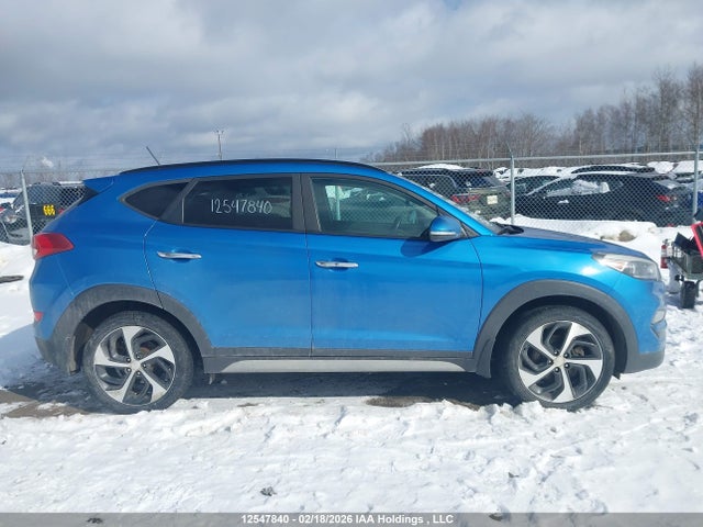 KM8J3CA26HU411674 Hyundai TUCSON SE
