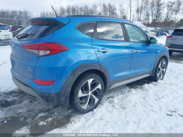 KM8J3CA26HU411674 Hyundai TUCSON SE