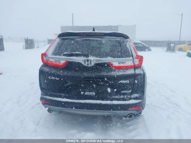 12548276 :رقم المزاد ، 2HKRW2H90KH123775 vin ، 2019 Honda Cr-v Touring مزاد بيع
