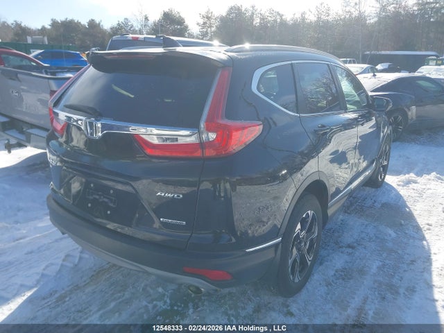 12548333 :رقم المزاد ، 2HKRW2H99KH114623 vin ، 2019 Honda Cr-v Touring مزاد بيع