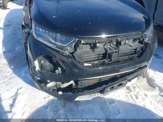 12548333 :رقم المزاد ، 2HKRW2H99KH114623 vin ، 2019 Honda Cr-v Touring مزاد بيع