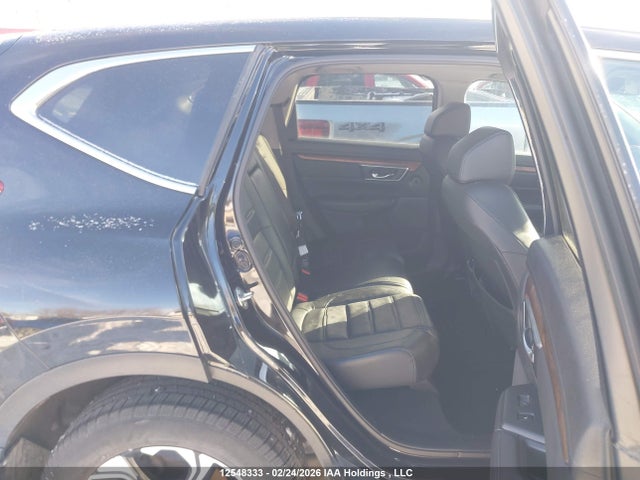 12548333 :رقم المزاد ، 2HKRW2H99KH114623 vin ، 2019 Honda Cr-v Touring مزاد بيع