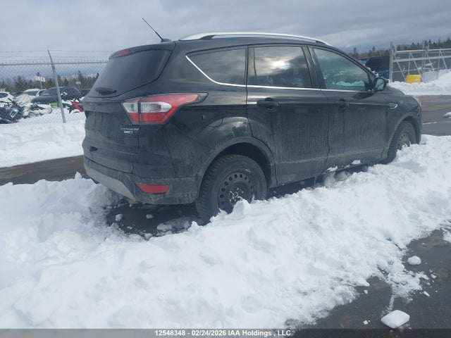 2017 Ford Escape Titanium მანქანა იყიდება აუქციონზე, vin: 1FMCU9J90HUB06791, აუქციონის ნომერი: 12548348