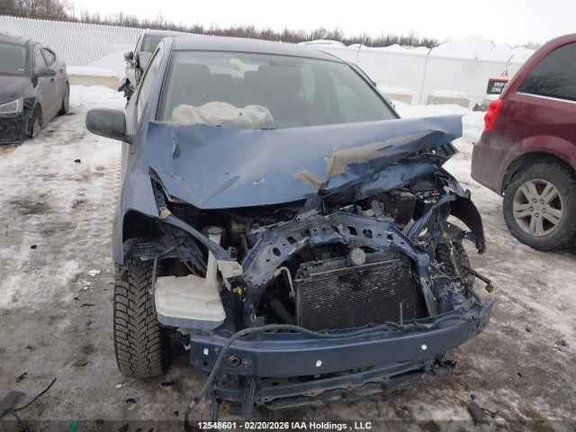 12548601 :رقم المزاد ، JTDBT923891342038 vin ، 2009 Toyota Yaris مزاد بيع