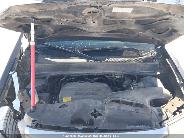 12551528 :رقم المزاد ، 5FNYF4H91CB506017 vin ، 2012 Honda Pilot Touring مزاد بيع