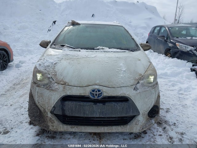 JTDKDTB38F1094525 Toyota PRIUS C