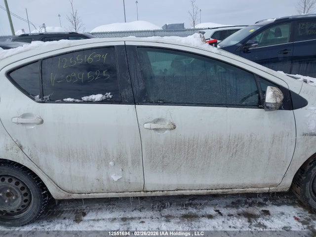 JTDKDTB38F1094525 Toyota PRIUS C