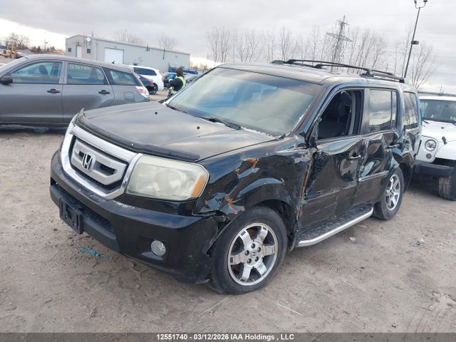 12551740 :رقم المزاد ، 5FNYF4H94BB501764 vin ، 2011 Honda Pilot مزاد بيع