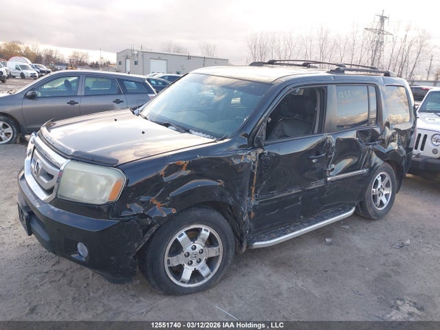 12551740 :رقم المزاد ، 5FNYF4H94BB501764 vin ، 2011 Honda Pilot مزاد بيع