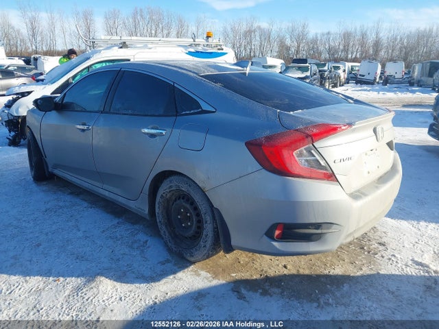 12552126 :رقم المزاد ، 2HGFC1F95HH102836 vin ، 2017 Honda Civic Touring مزاد بيع