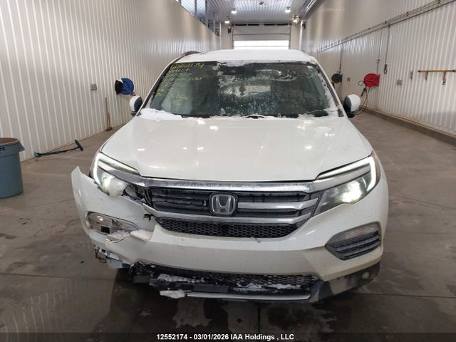 Продажа на аукционе авто 2016 Honda Pilot Touring, vin: 5FNYF6H90GB507807, номер лота: 12552174