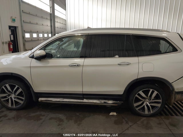 Продажа на аукционе авто 2016 Honda Pilot Touring, vin: 5FNYF6H90GB507807, номер лота: 12552174