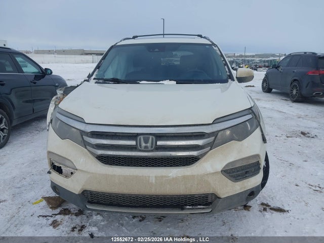 12552672 :رقم المزاد ، 5FNYF6H92JB504866 vin ، 2018 Honda Pilot Touring مزاد بيع