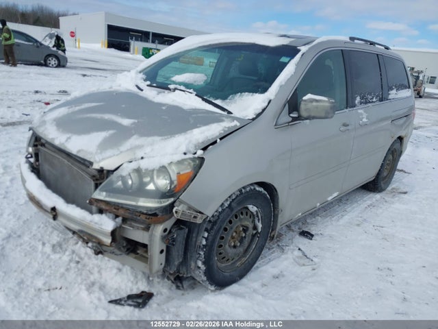 12552729 :رقم المزاد ، 5FNRL38786B509345 vin ، 2006 Honda Odyssey Ex-l مزاد بيع