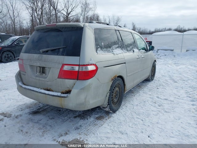 12552729 :رقم المزاد ، 5FNRL38786B509345 vin ، 2006 Honda Odyssey Ex-l مزاد بيع