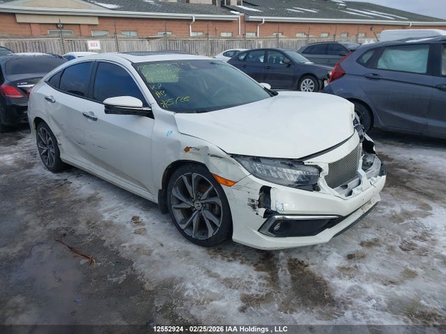 12552924 :رقم المزاد ، 2HGFC1F9XKH101012 vin ، 2019 Honda Civic Touring مزاد بيع