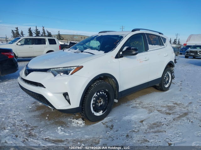 2T3JFREV9JW732104 Toyota RAV4 SE