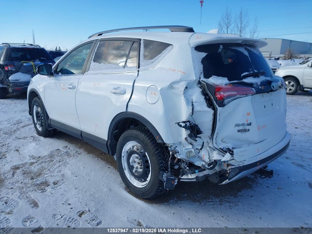 2T3JFREV9JW732104 Toyota RAV4 SE