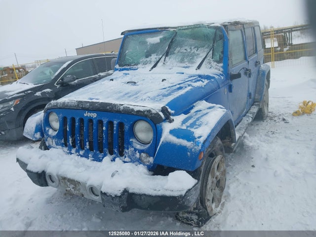 1C4BJWEG6EL285873 Jeep Wrangler Unlimited Sahara
