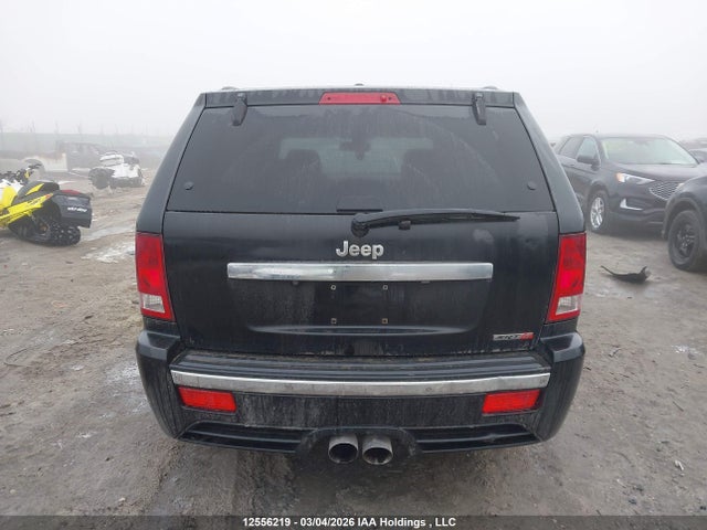 2009 Jeep Grand Cherokee Srt-8 მანქანა იყიდება აუქციონზე, vin: 1J8HR78W49C552373, აუქციონის ნომერი: 12556219