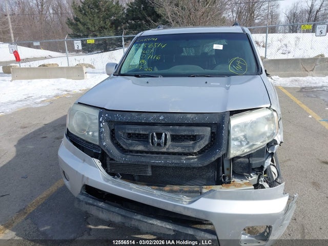 2011 Honda Pilot Touring მანქანა იყიდება აუქციონზე, vin: 5FNYF4H9XBB507116, აუქციონის ნომერი: 12556514