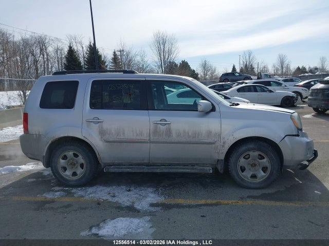 2011 Honda Pilot Touring მანქანა იყიდება აუქციონზე, vin: 5FNYF4H9XBB507116, აუქციონის ნომერი: 12556514