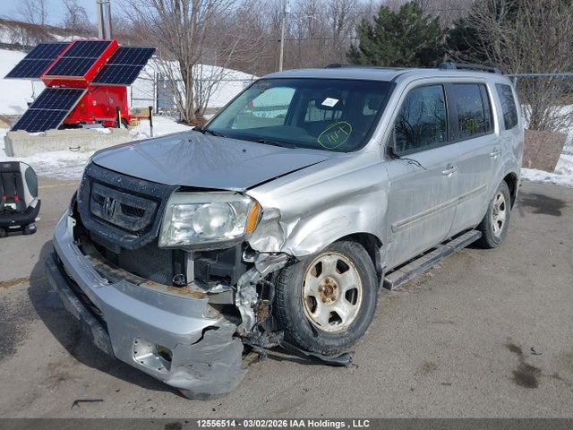2011 Honda Pilot Touring მანქანა იყიდება აუქციონზე, vin: 5FNYF4H9XBB507116, აუქციონის ნომერი: 12556514