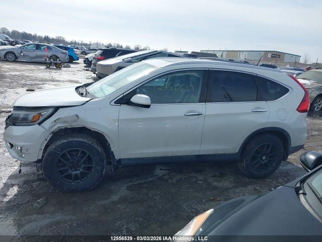 2016 Honda Cr-v Touring მანქანა იყიდება აუქციონზე, vin: 5J6RM4H98GL805690, აუქციონის ნომერი: 12556539