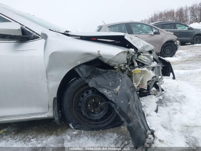 12556553 :رقم المزاد ، 4T1BF1FK6CU106466 vin ، 2012 Toyota Camry Le مزاد بيع
