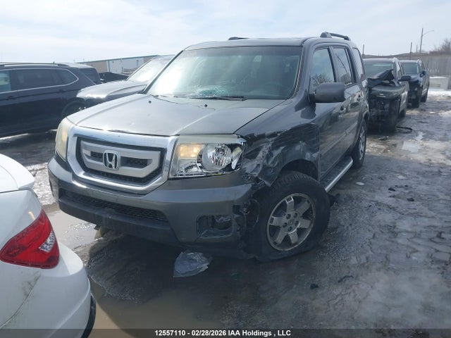 12557110 :رقم المزاد ، 5FNYF4H91BB504489 vin ، 2011 Honda Pilot Touring مزاد بيع