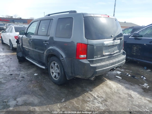 12557110 :رقم المزاد ، 5FNYF4H91BB504489 vin ، 2011 Honda Pilot Touring مزاد بيع