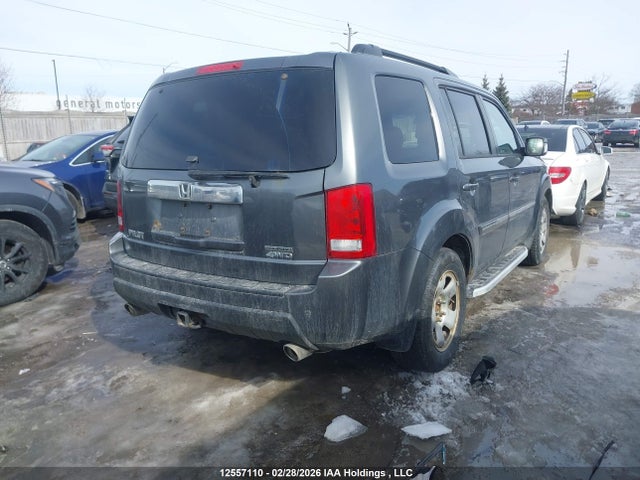 12557110 :رقم المزاد ، 5FNYF4H91BB504489 vin ، 2011 Honda Pilot Touring مزاد بيع