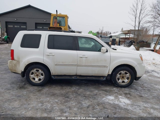12557565 :رقم المزاد ، 5FNYF4H97EB501486 vin ، 2014 Honda Pilot Touring مزاد بيع