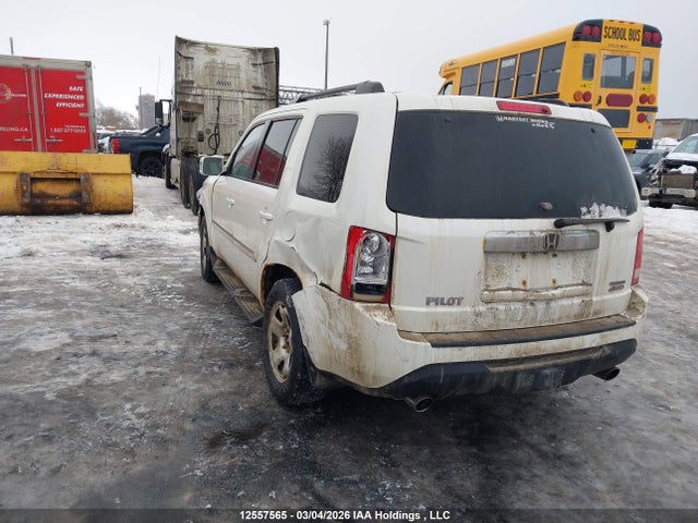 12557565 :رقم المزاد ، 5FNYF4H97EB501486 vin ، 2014 Honda Pilot Touring مزاد بيع