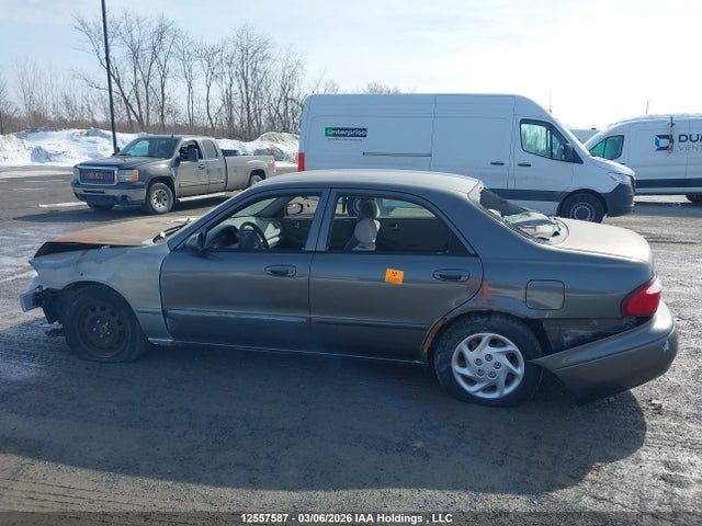 12557587 :رقم المزاد ، 1YVGF22C115223842 vin ، 2001 Mazda 626 Es/lx مزاد بيع