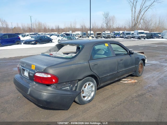 12557587 :رقم المزاد ، 1YVGF22C115223842 vin ، 2001 Mazda 626 Es/lx مزاد بيع