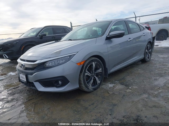 2HGFC1F90JH104001 Honda Civic Touring