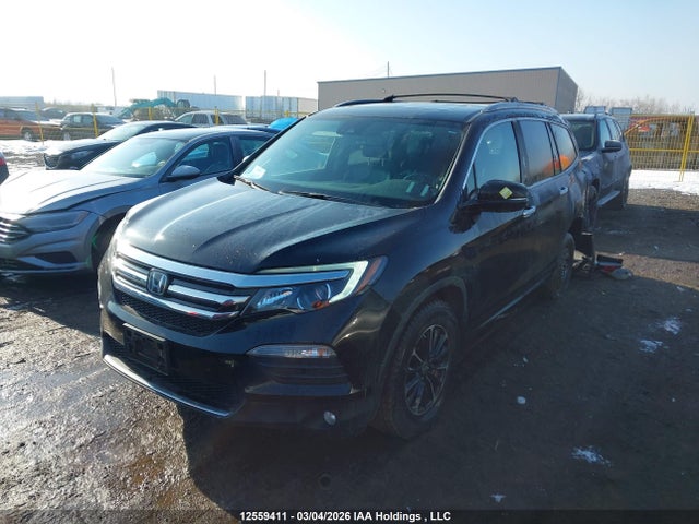 5FNYF6H90GB506317 Honda Pilot Touring