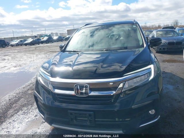 Продаж на аукціоні авто 2020 Honda Pilot Touring, vin: 5FNYF6H90LB503783, номер лоту: 12559434