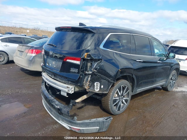 Продаж на аукціоні авто 2020 Honda Pilot Touring, vin: 5FNYF6H90LB503783, номер лоту: 12559434