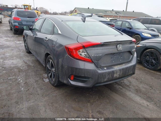 2017 Honda Civic Touring მანქანა იყიდება აუქციონზე, vin: 2HGFC1F99HH101074, აუქციონის ნომერი: 12559776