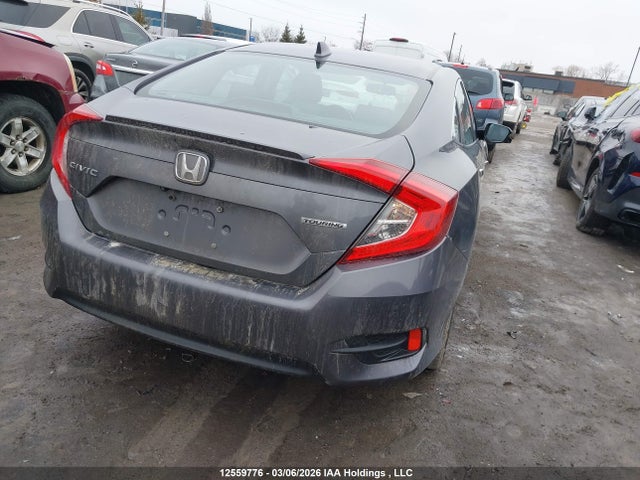 2017 Honda Civic Touring მანქანა იყიდება აუქციონზე, vin: 2HGFC1F99HH101074, აუქციონის ნომერი: 12559776