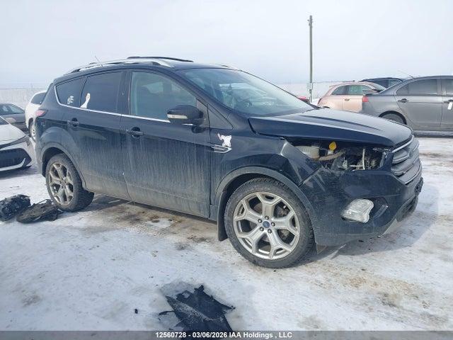 12560728 :رقم المزاد ، 1FMCU9J91HUE77944 vin ، 2017 Ford Escape Titanium مزاد بيع