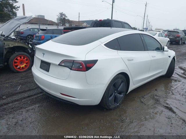 2020 Tesla Model 3 Standard Range Plus მანქანა იყიდება აუქციონზე, vin: 5YJ3E1EA0LF715680, აუქციონის ნომერი: 12560832