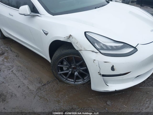2020 Tesla Model 3 Standard Range Plus მანქანა იყიდება აუქციონზე, vin: 5YJ3E1EA0LF715680, აუქციონის ნომერი: 12560832