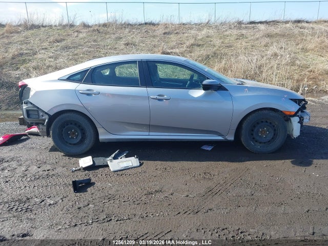 12561209 :رقم المزاد ، 2HGFC2F69JH031707 vin ، 2018 Honda Civic Se مزاد بيع